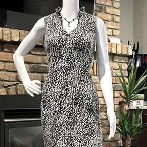 Calvin Klein dress, size 8, color black and white. Gold zipper on the back.